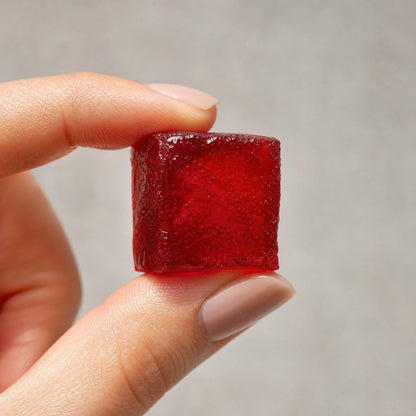A single Spark Cube held between two fingers